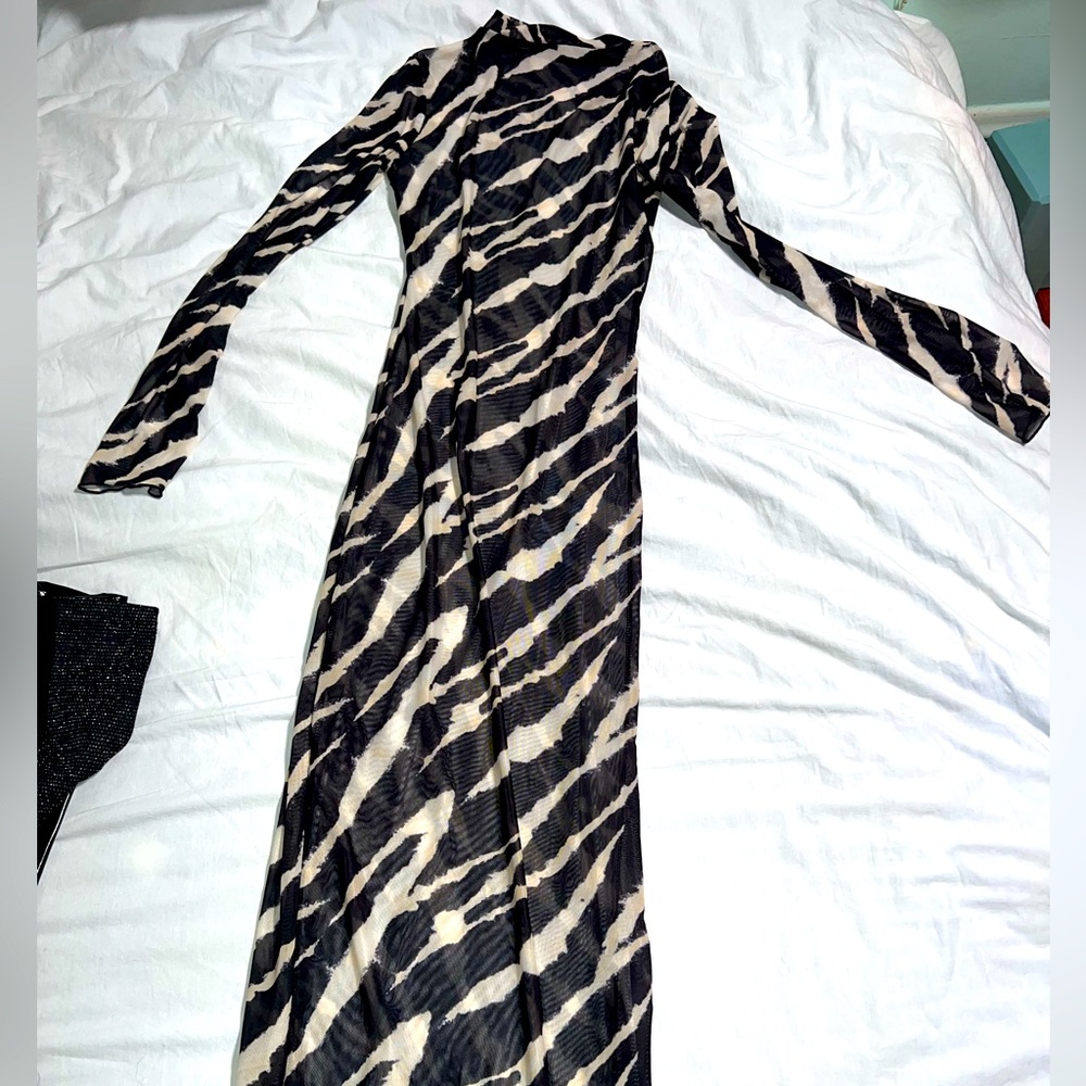 Long sleeve zebra print dress.